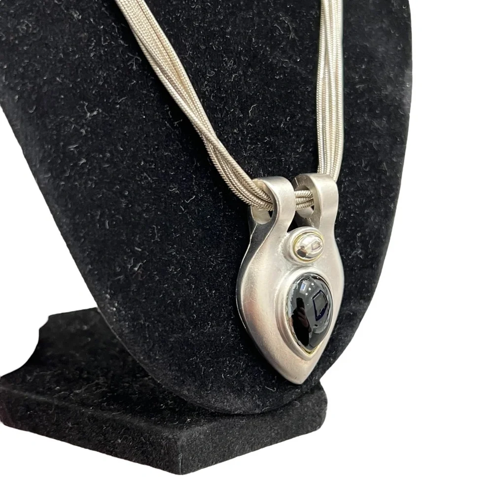 VINTAGE 6 CHAIN SILVER TONE NECKLACE WITH TEARDROP PENDANT WITH BLACK STONE